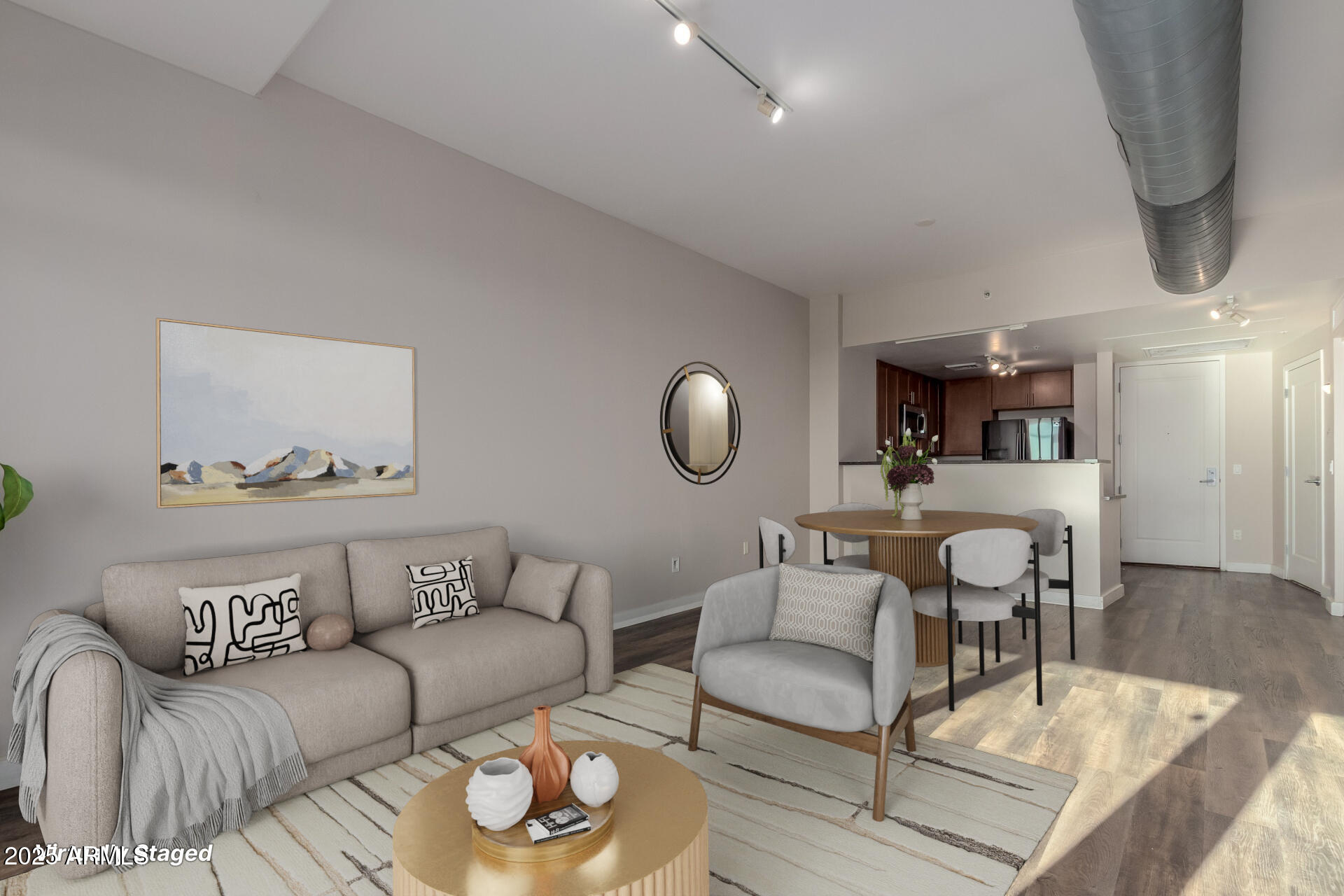 310 South 4th Street, Unit 1902 Phoenix, AZ 85004 - Photo 9 of 37 a living room with furniture and a wooden floor