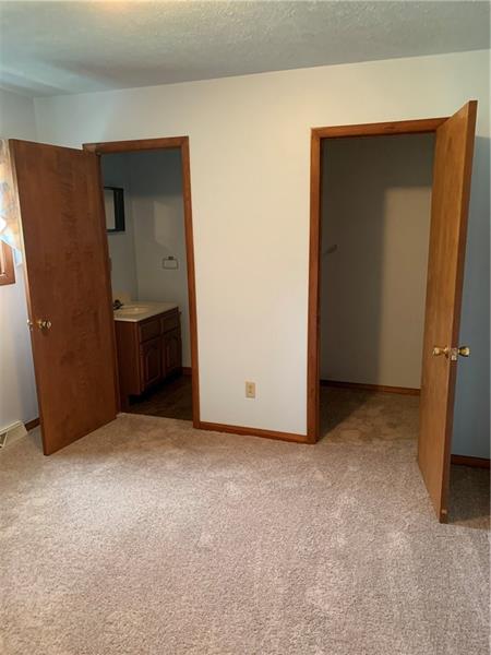 166 Schiebel Road Butler, PA 16002 - Photo 13 of 23 THIRD BEDROOM WITH HALF BATH