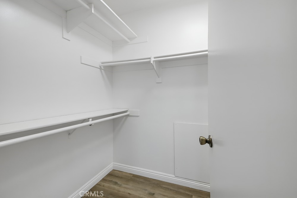 115 Remington Irvine, CA 92620 - Photo 16 of 25 a view of a room with racks on the wall