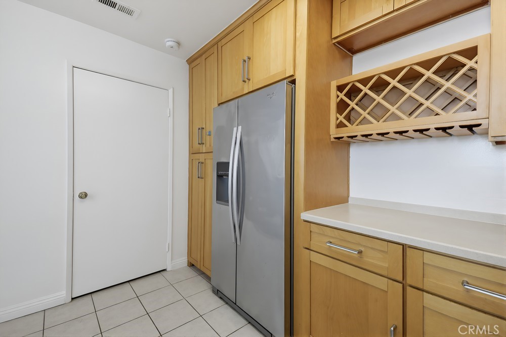 115 Remington Irvine, CA 92620 - Photo 8 of 25 a view of a refrigerator and utility room