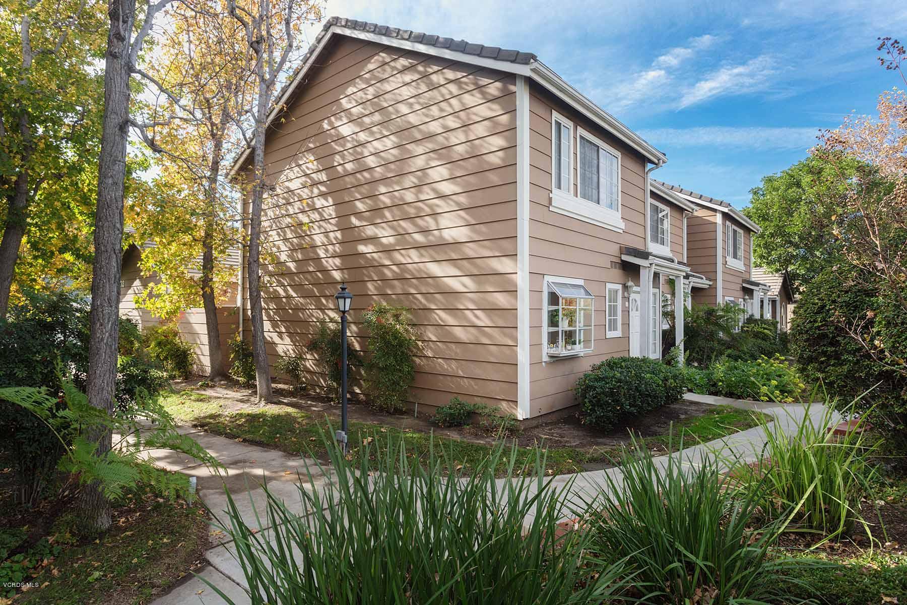 3902 Cochran Street, Unit 4 Simi Valley, CA 93063 - Photo 1 of 26 a view of a house with a yard