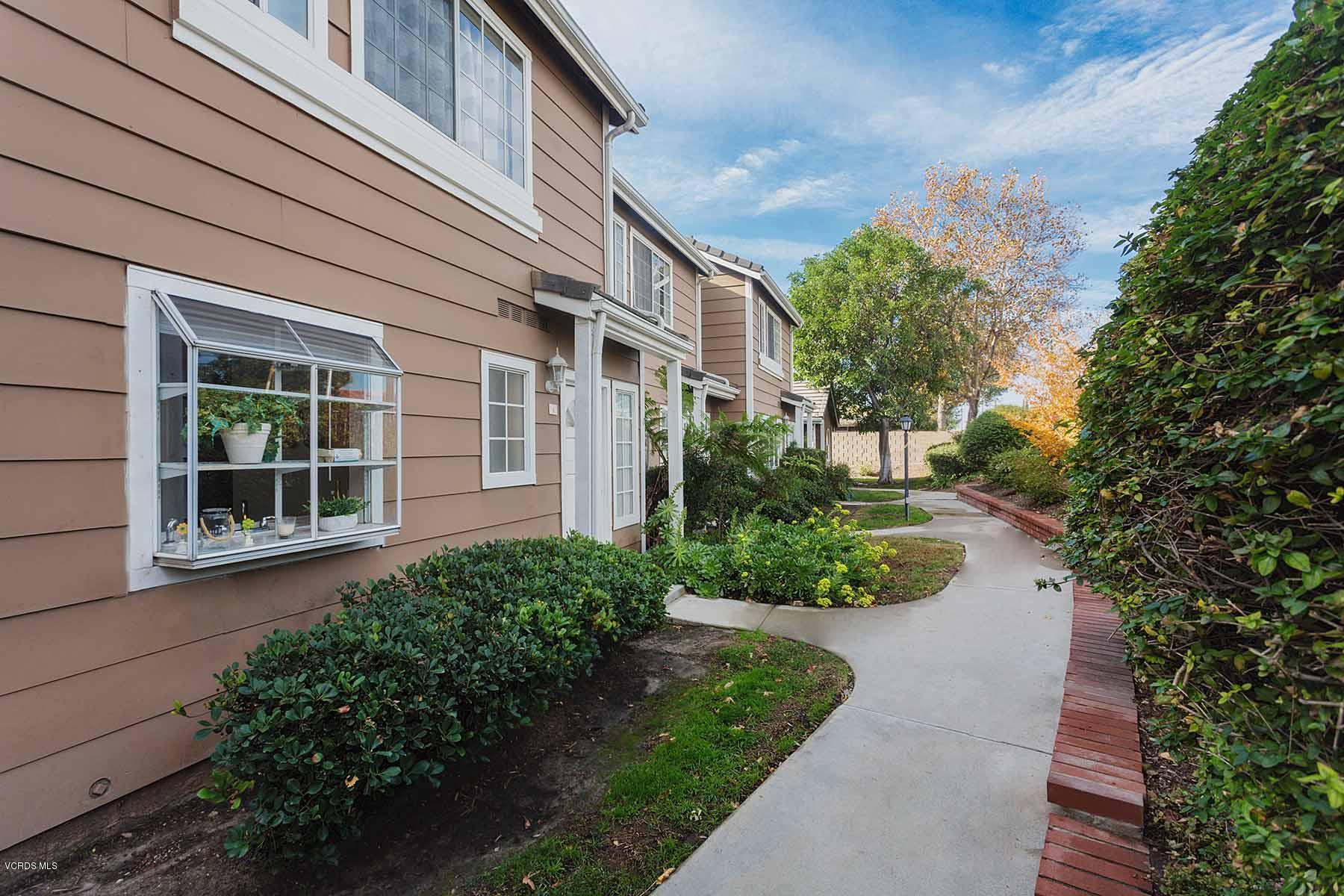 3902 Cochran Street, Unit 4 Simi Valley, CA 93063 - Photo 2 of 26 a house view with a garden space