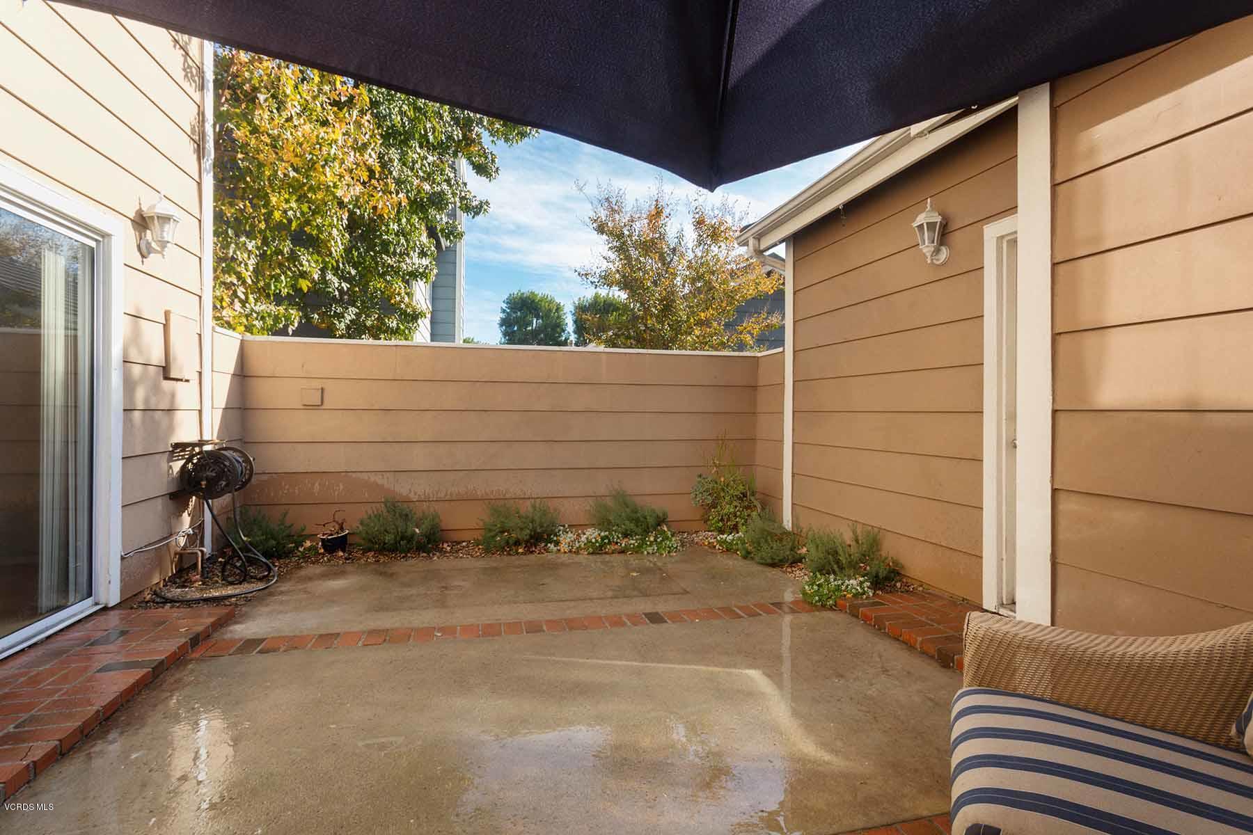 3902 Cochran Street, Unit 4 Simi Valley, CA 93063 - Photo 23 of 26 a view of backyard with tub and outdoor shower