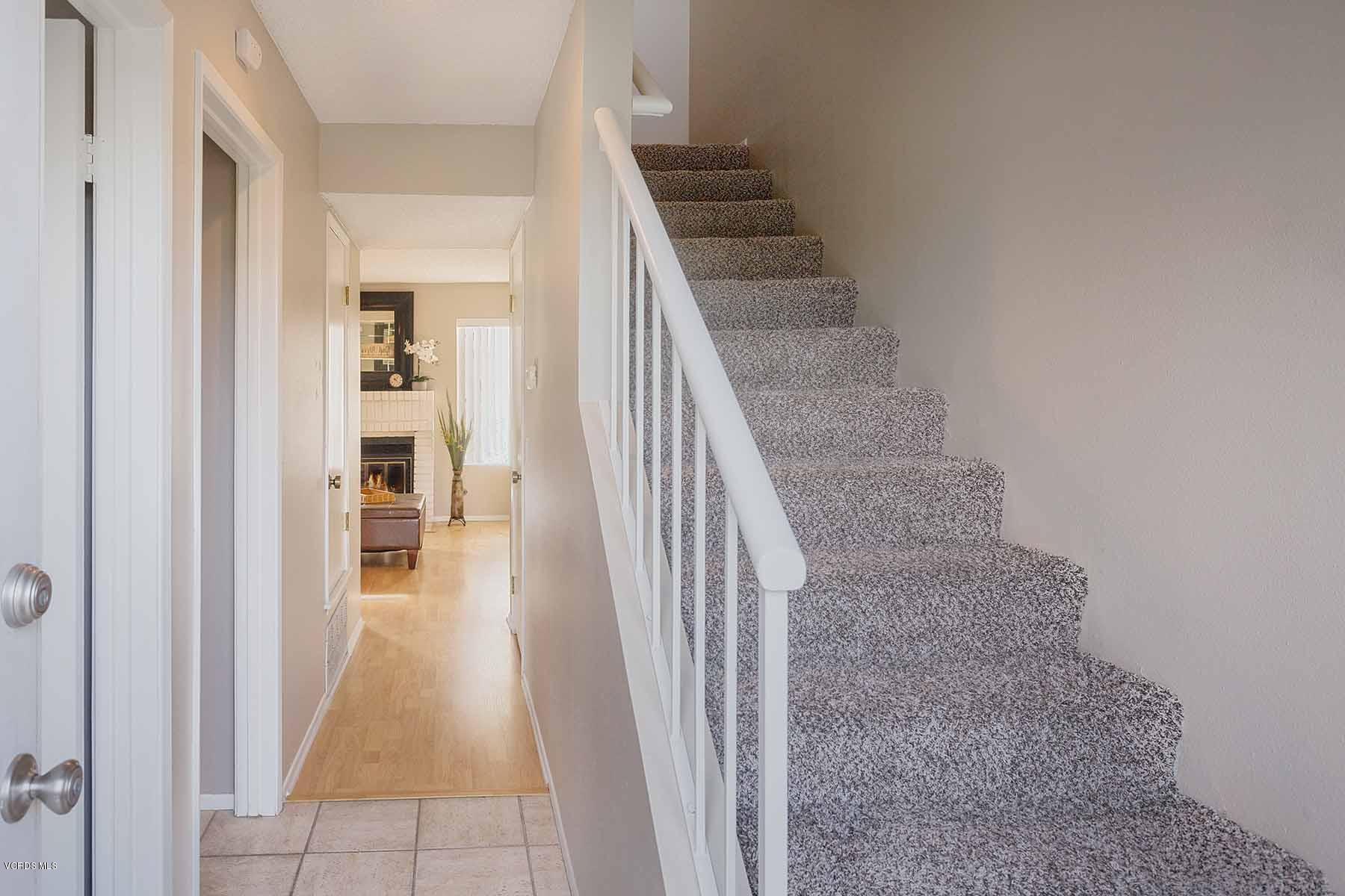 3902 Cochran Street, Unit 4 Simi Valley, CA 93063 - Photo 4 of 26 a view of entryway and hall with wooden floor
