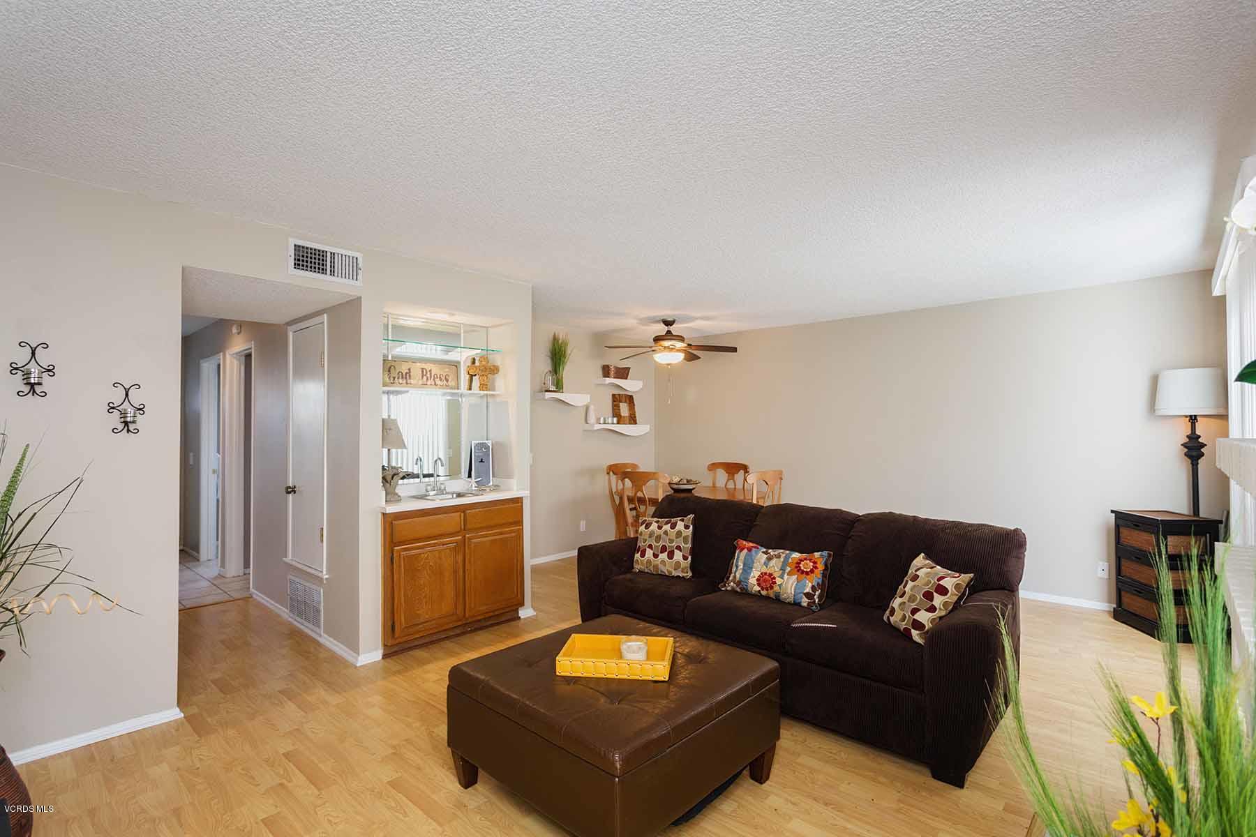 3902 Cochran Street, Unit 4 Simi Valley, CA 93063 - Photo 8 of 26 a living room with furniture and a wooden floor