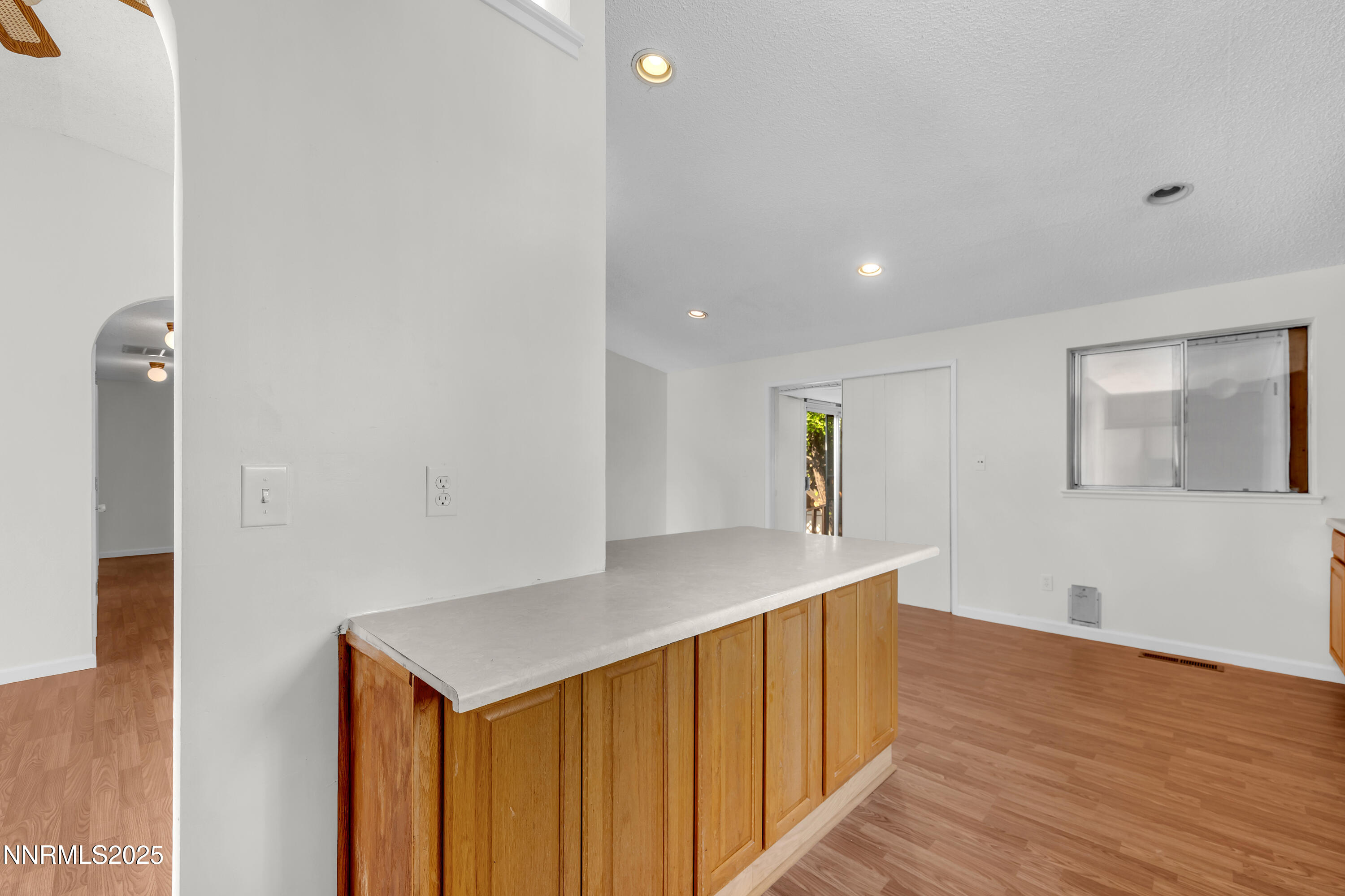 8581 Corrigan Way Reno, NV 89506 - Photo 16 of 40 a view of hallway with wooden floor
