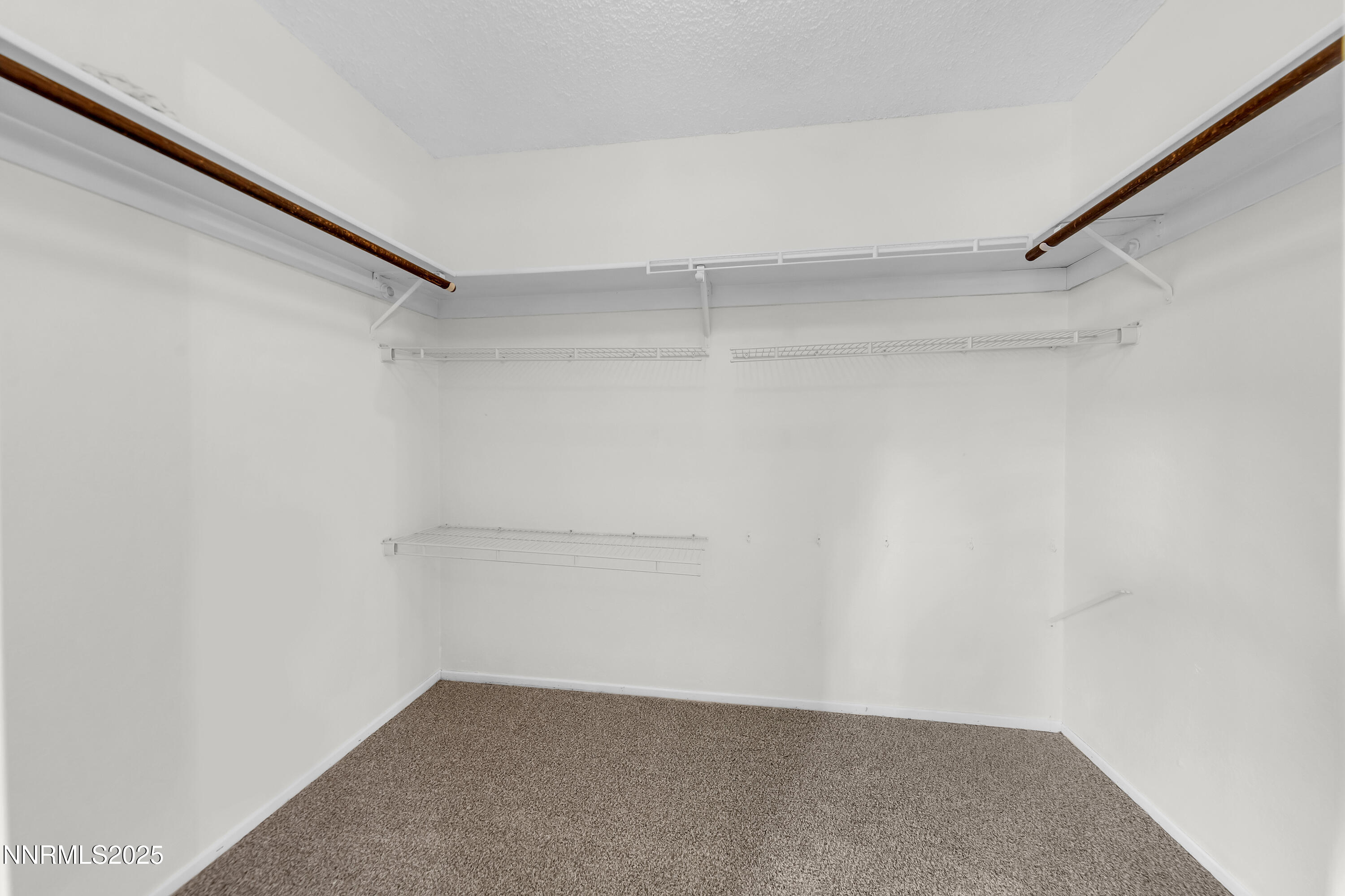 8581 Corrigan Way Reno, NV 89506 - Photo 24 of 40 a view of an empty walk in closet
