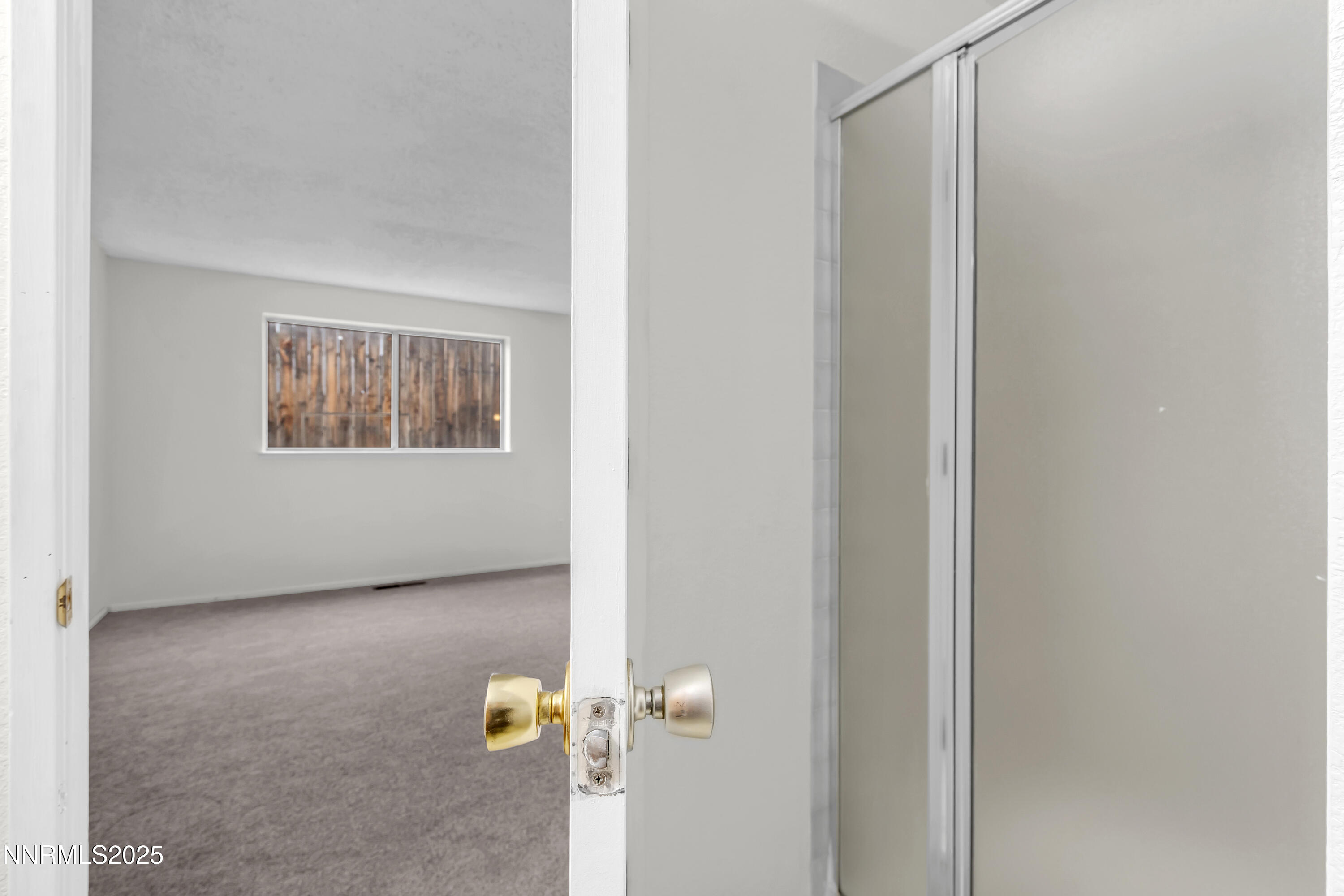8581 Corrigan Way Reno, NV 89506 - Photo 26 of 40 a view of livingroom with furniture and a window