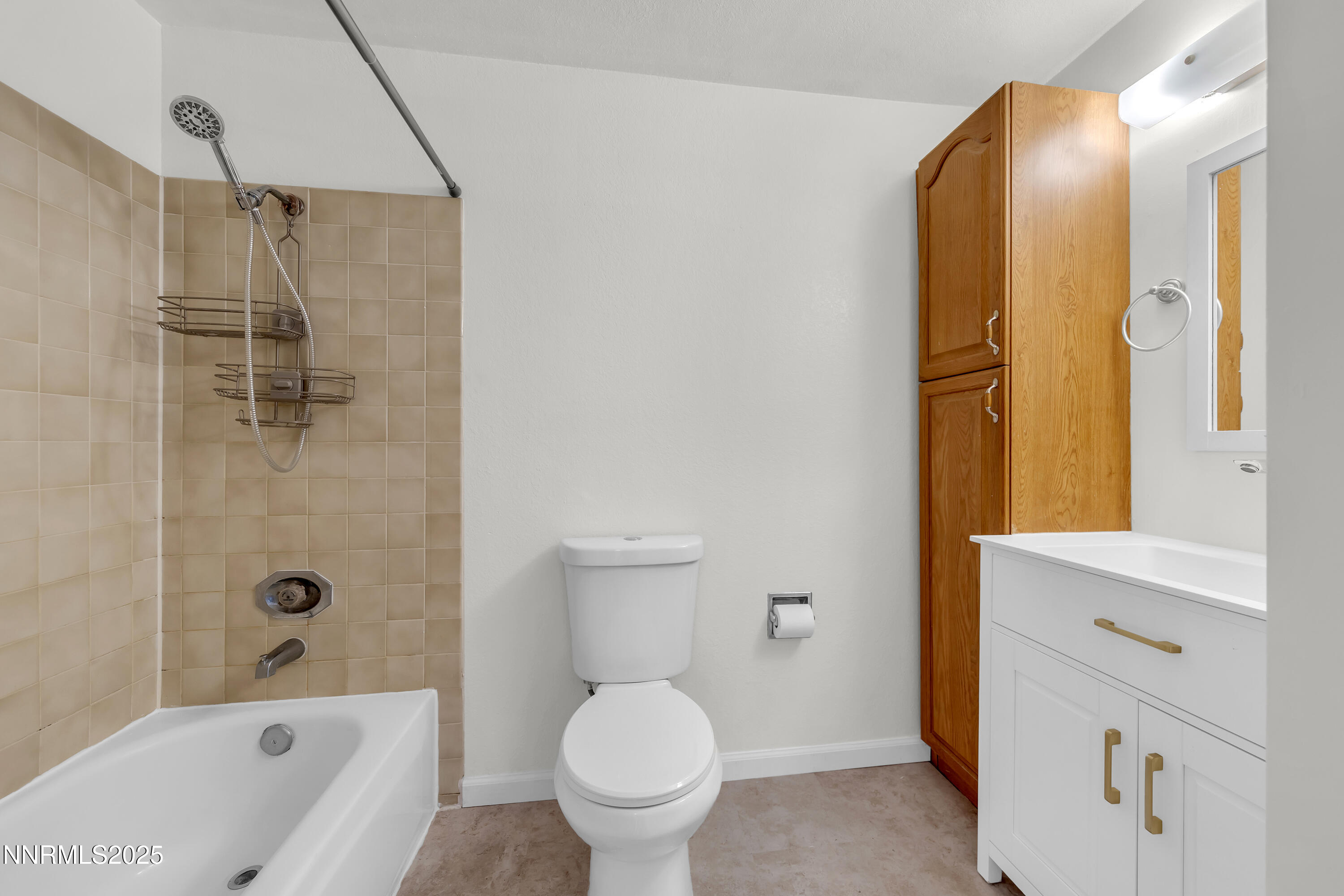 8581 Corrigan Way Reno, NV 89506 - Photo 30 of 40 a bathroom with a sink toilet and shower