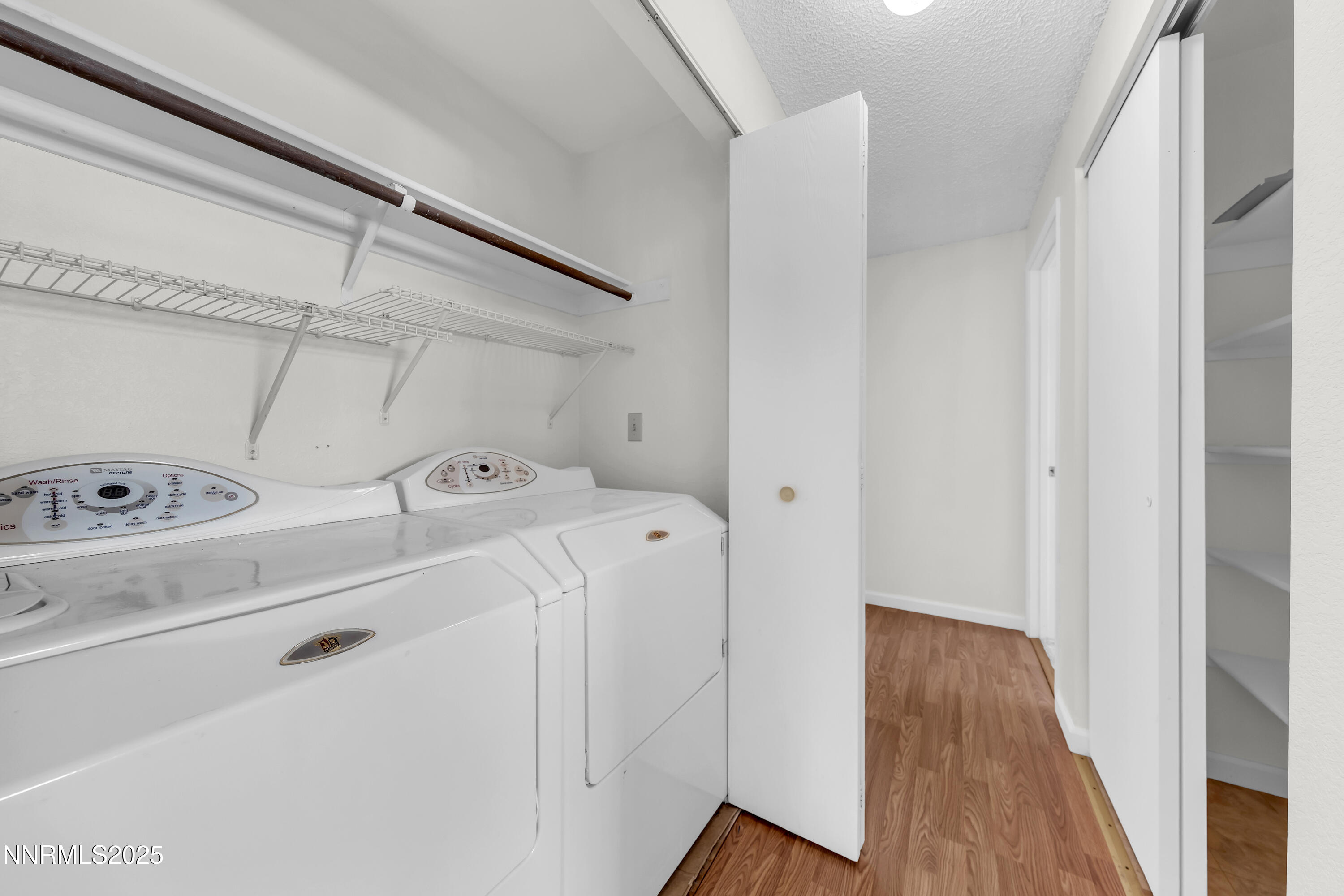 8581 Corrigan Way Reno, NV 89506 - Photo 31 of 40 a utility room with dryer and washer