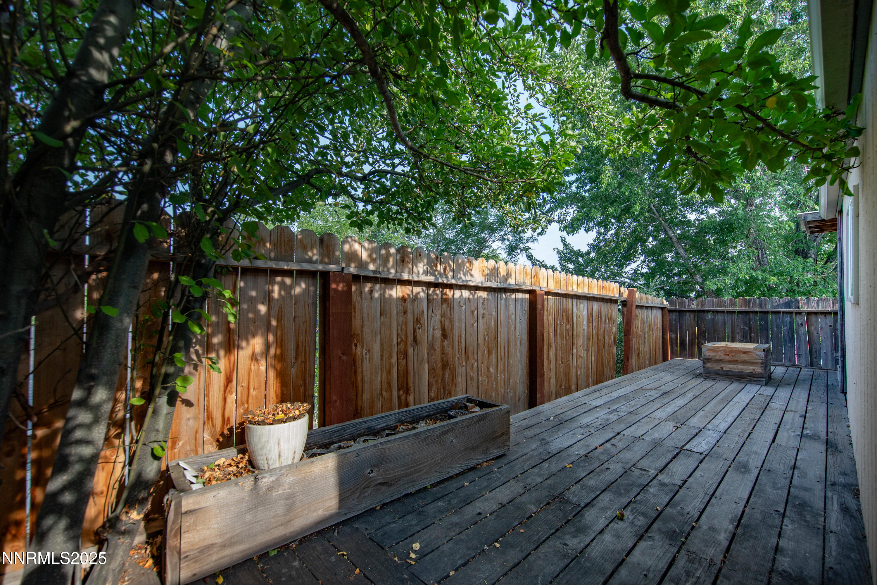 8581 Corrigan Way Reno, NV 89506 - Photo 36 of 40 a view of deck with wooden floor and fence