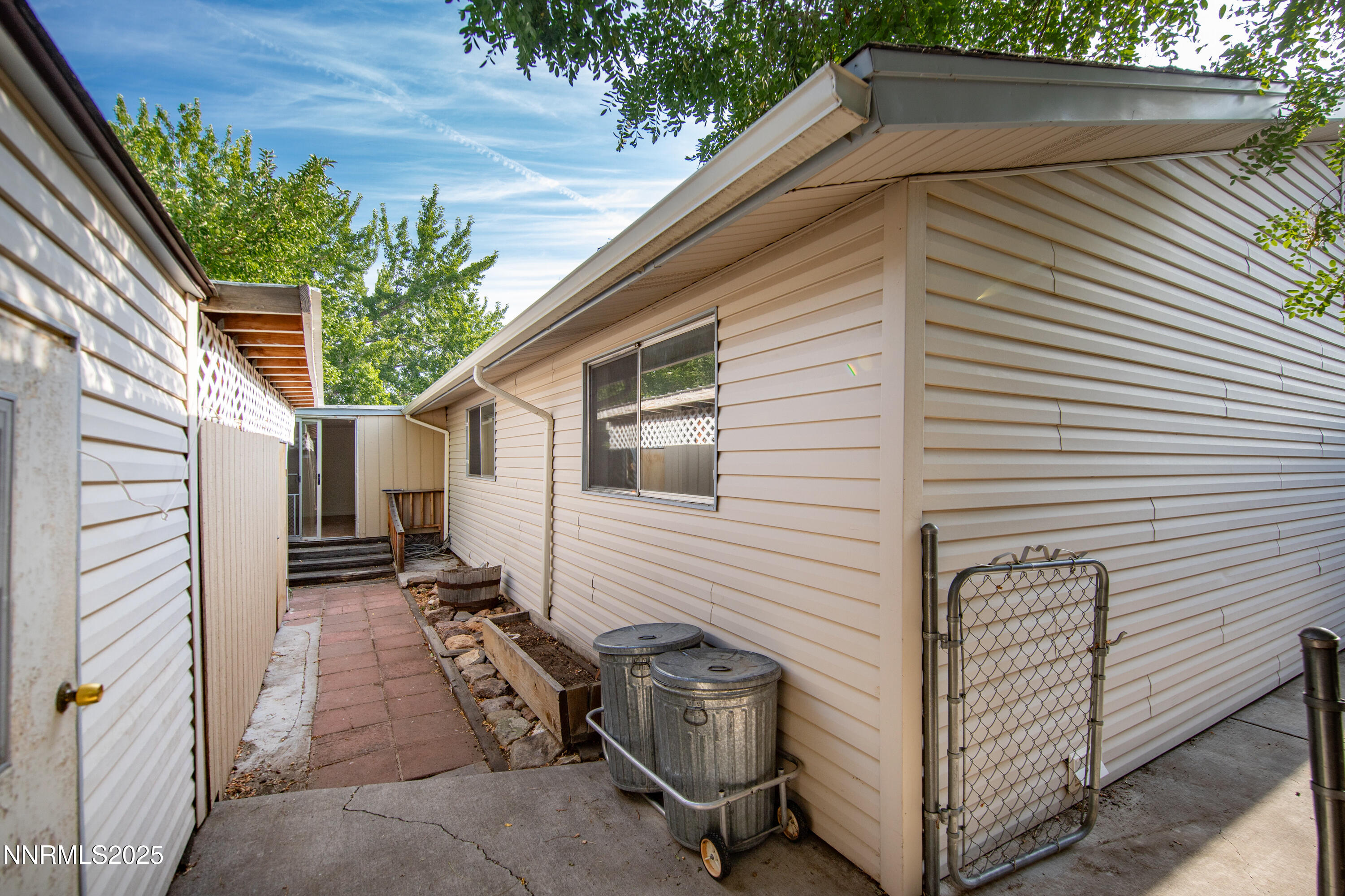 8581 Corrigan Way Reno, NV 89506 - Photo 38 of 40 a view of a house with a yard