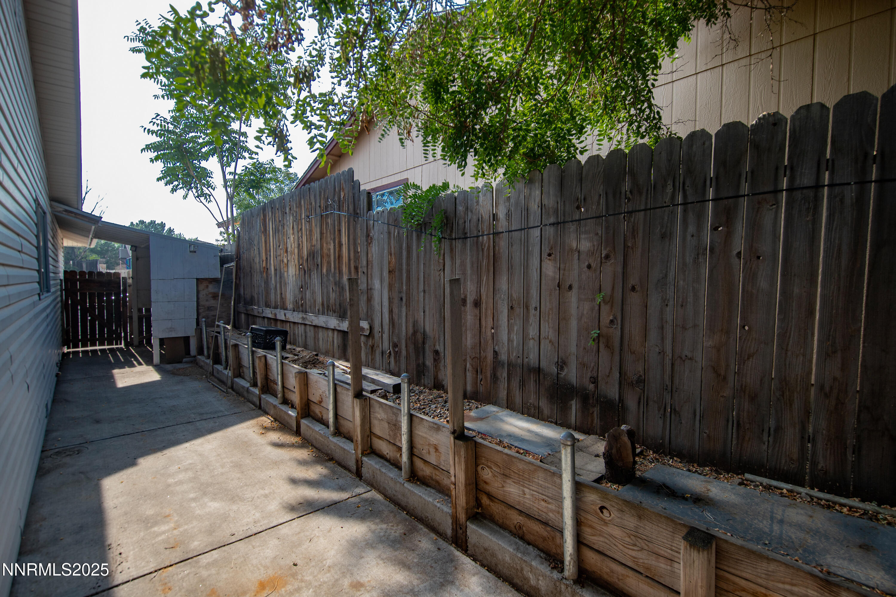 8581 Corrigan Way Reno, NV 89506 - Photo 39 of 40 a view of outdoor space with wooden fence