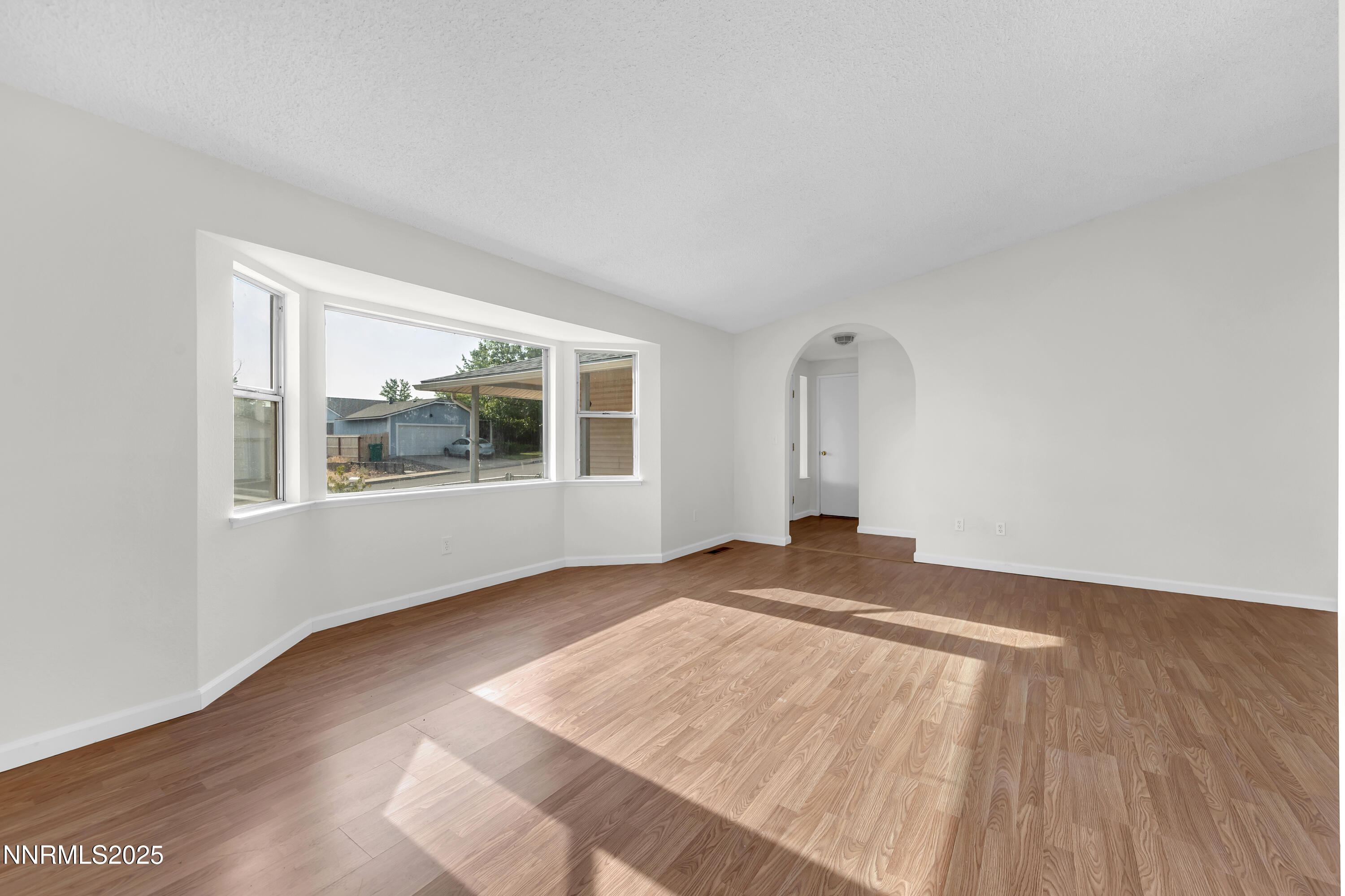 8581 Corrigan Way Reno, NV 89506 - Photo 7 of 40 a view of empty room with window