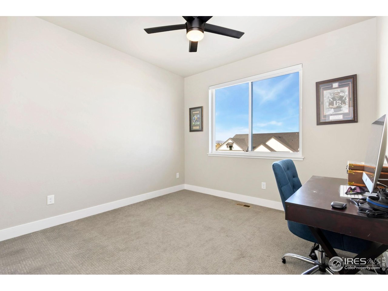 6709 Stone Point Drive Timnath, CO 80547 - Photo 29 of 41 a workspace with furniture and window