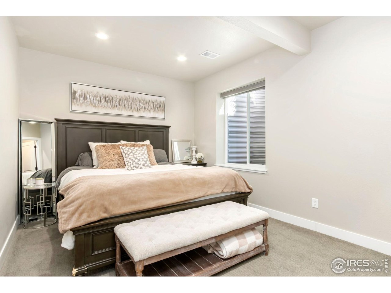 6709 Stone Point Drive Timnath, CO 80547 - Photo 34 of 41 a bedroom with a bed and window