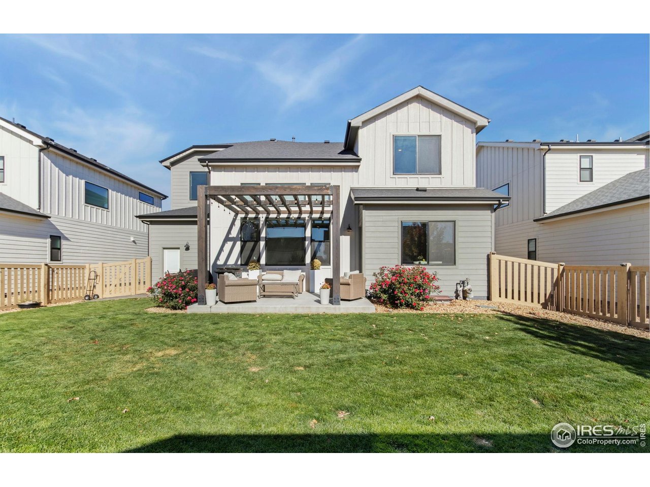 6709 Stone Point Drive Timnath, CO 80547 - Photo 38 of 41 a view of front a house with a yard