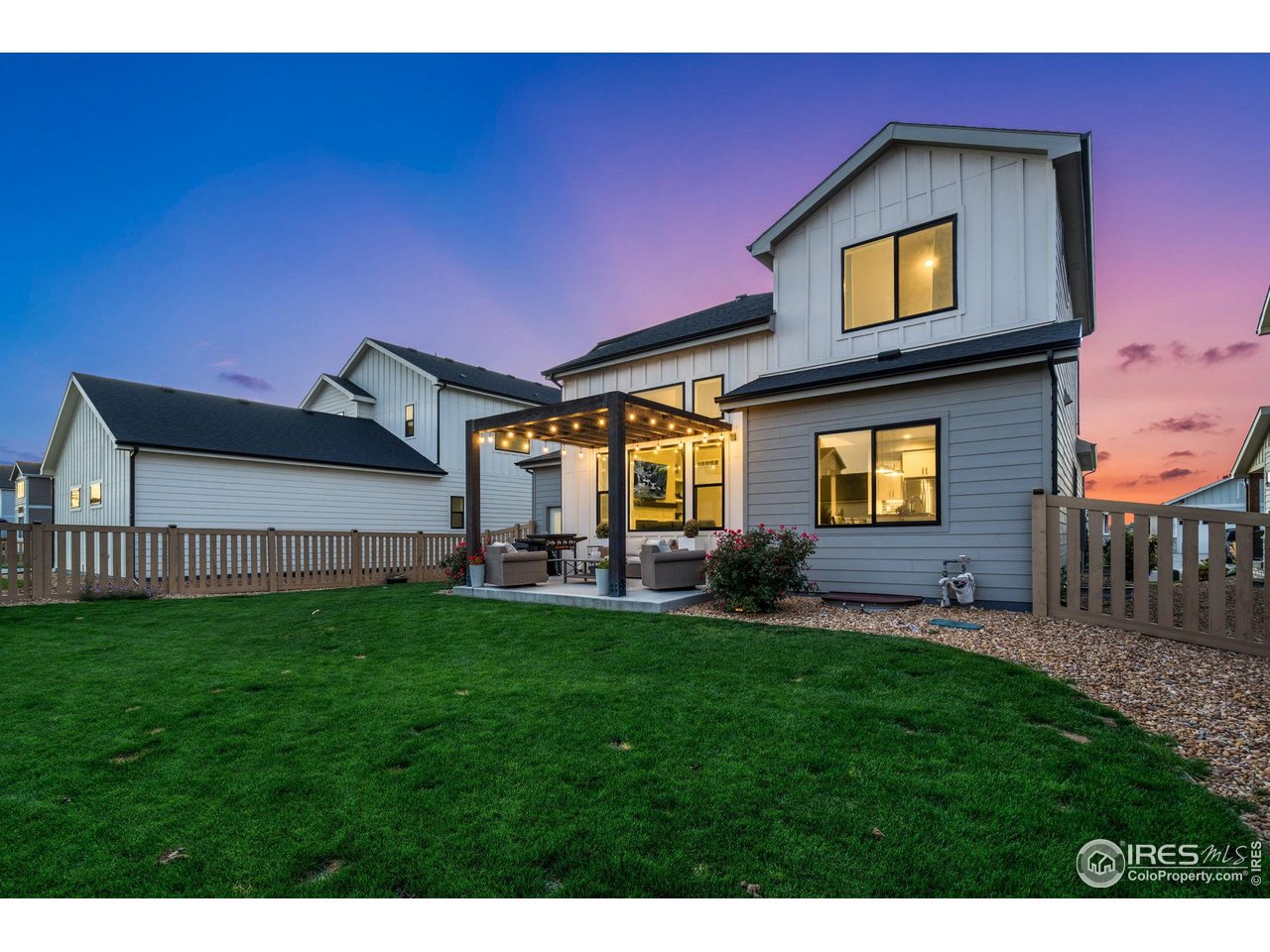 6709 Stone Point Drive Timnath, CO 80547 - Photo 4 of 41 a view of front of a house with a yard