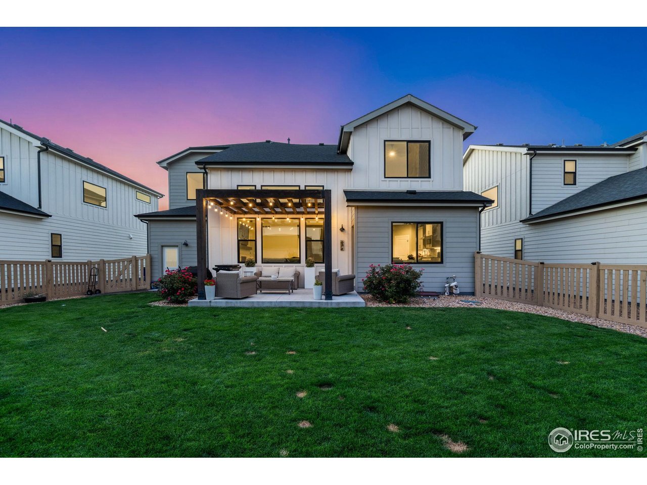 6709 Stone Point Drive Timnath, CO 80547 - Photo 5 of 41 a view of a yard in front of a house