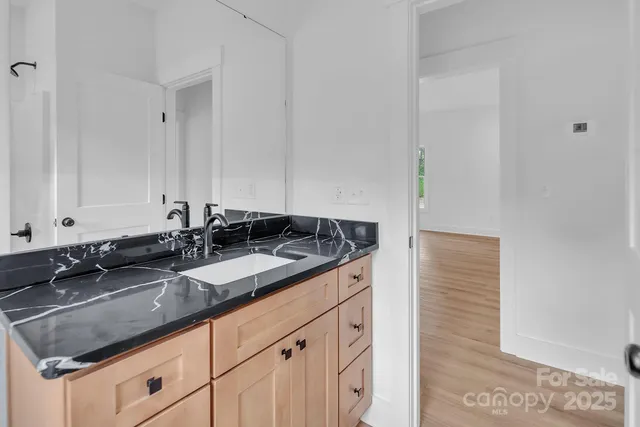 a kitchen with a sink and a window
