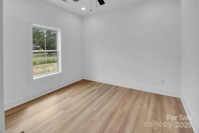a view of a street with houses