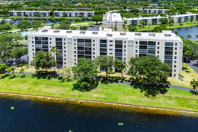 an aerial view of a building with outdoor area