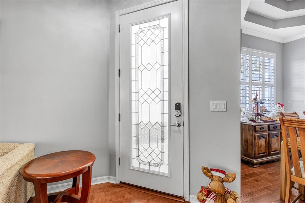 20804 Eustis Road Land O Lakes, FL 34637 - Photo 4 of 65 a view of a workspace with furniture and a window