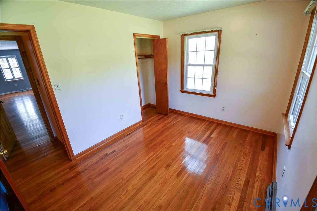288 Daniel Road Blackstone, VA 23824 - Photo 25 of 38 Unfurnished bedroom featuring wood finished floors