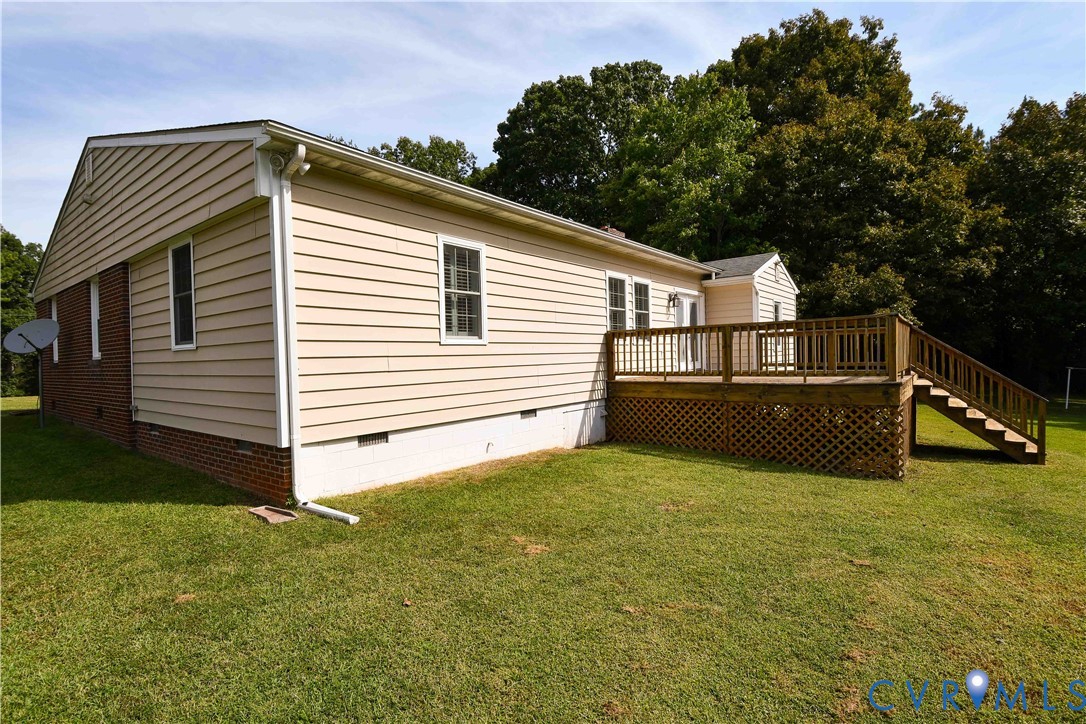 288 Daniel Road Blackstone, VA 23824 - Photo 7 of 38 View of side of property with crawl space, stairwa