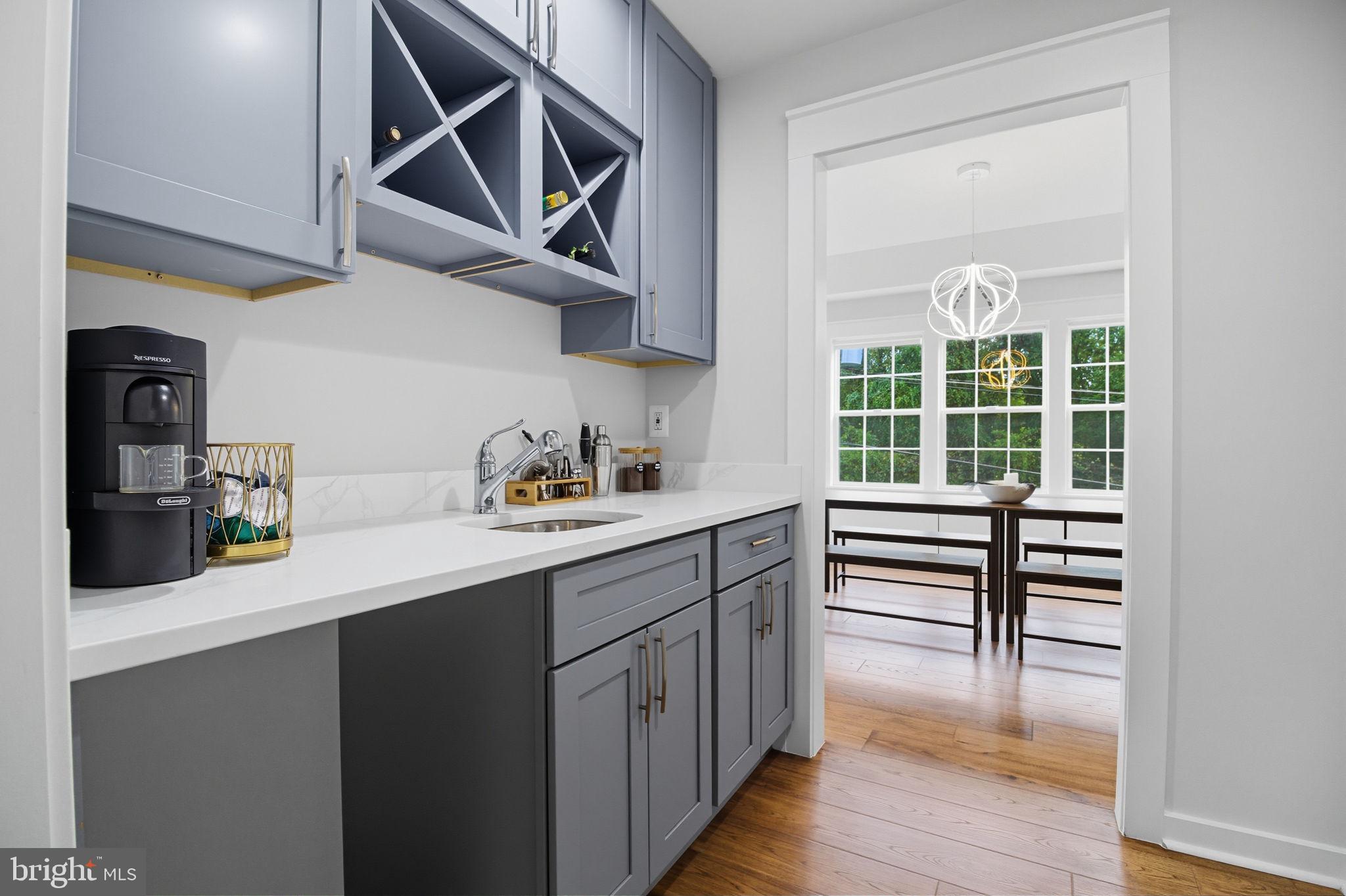 18518 Old Triangle Road Triangle, VA 22172 - Photo 11 of 39 a kitchen with stainless steel appliances a stove and cabinets