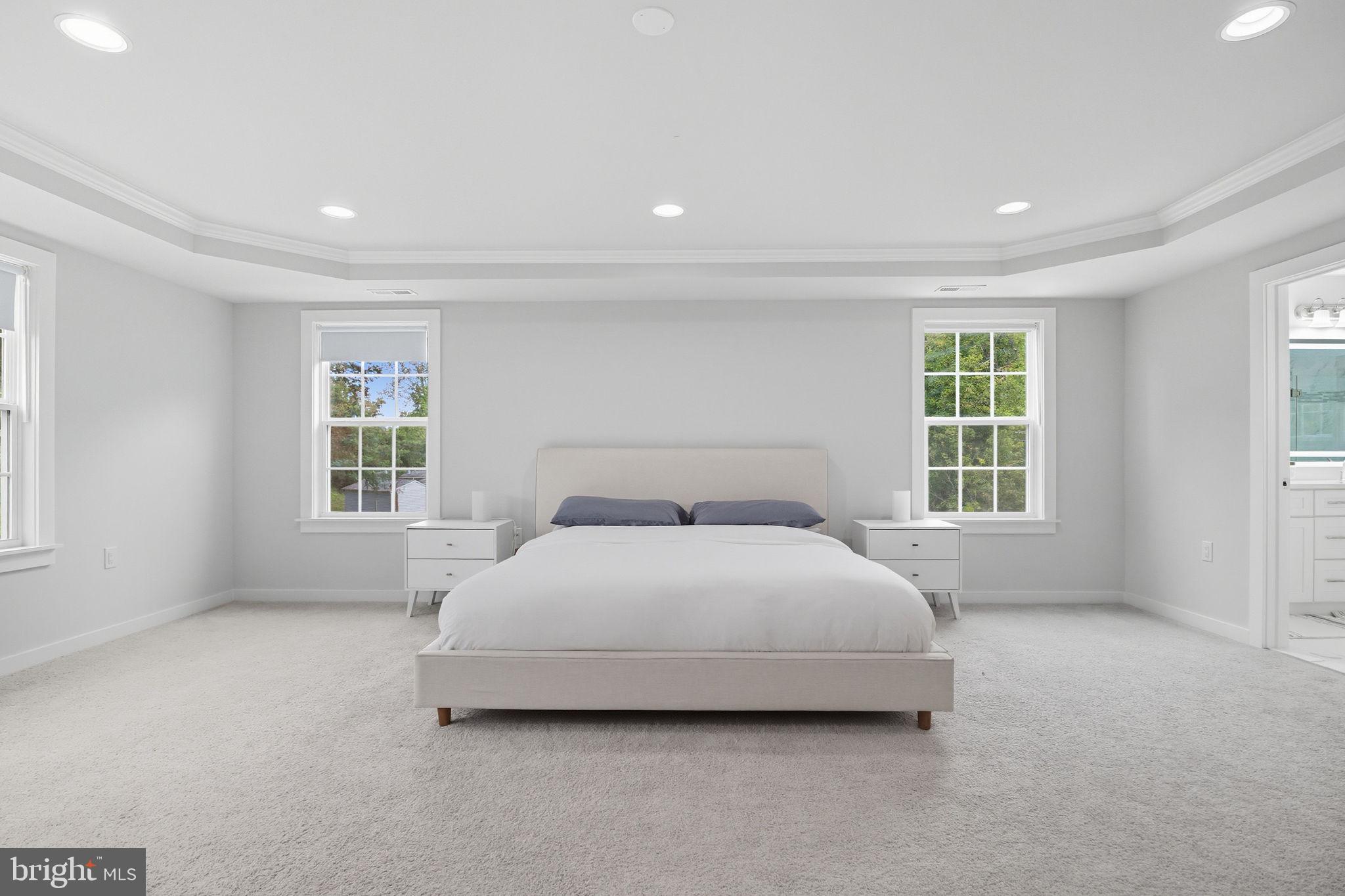 18518 Old Triangle Road Triangle, VA 22172 - Photo 20 of 39 a spacious bedroom with a bed and a window