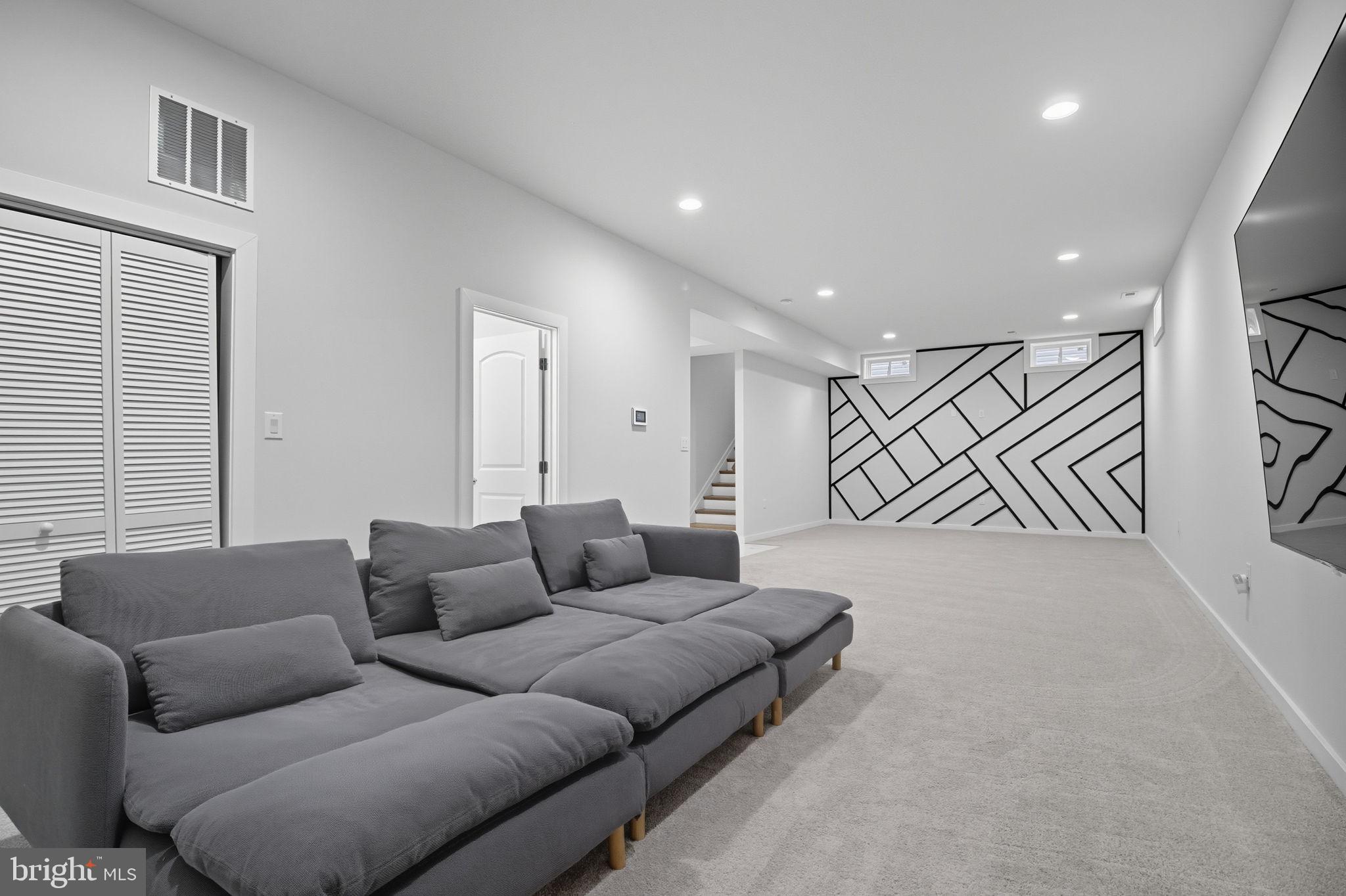 18518 Old Triangle Road Triangle, VA 22172 - Photo 2 of 39 a living room with furniture and a wall painting