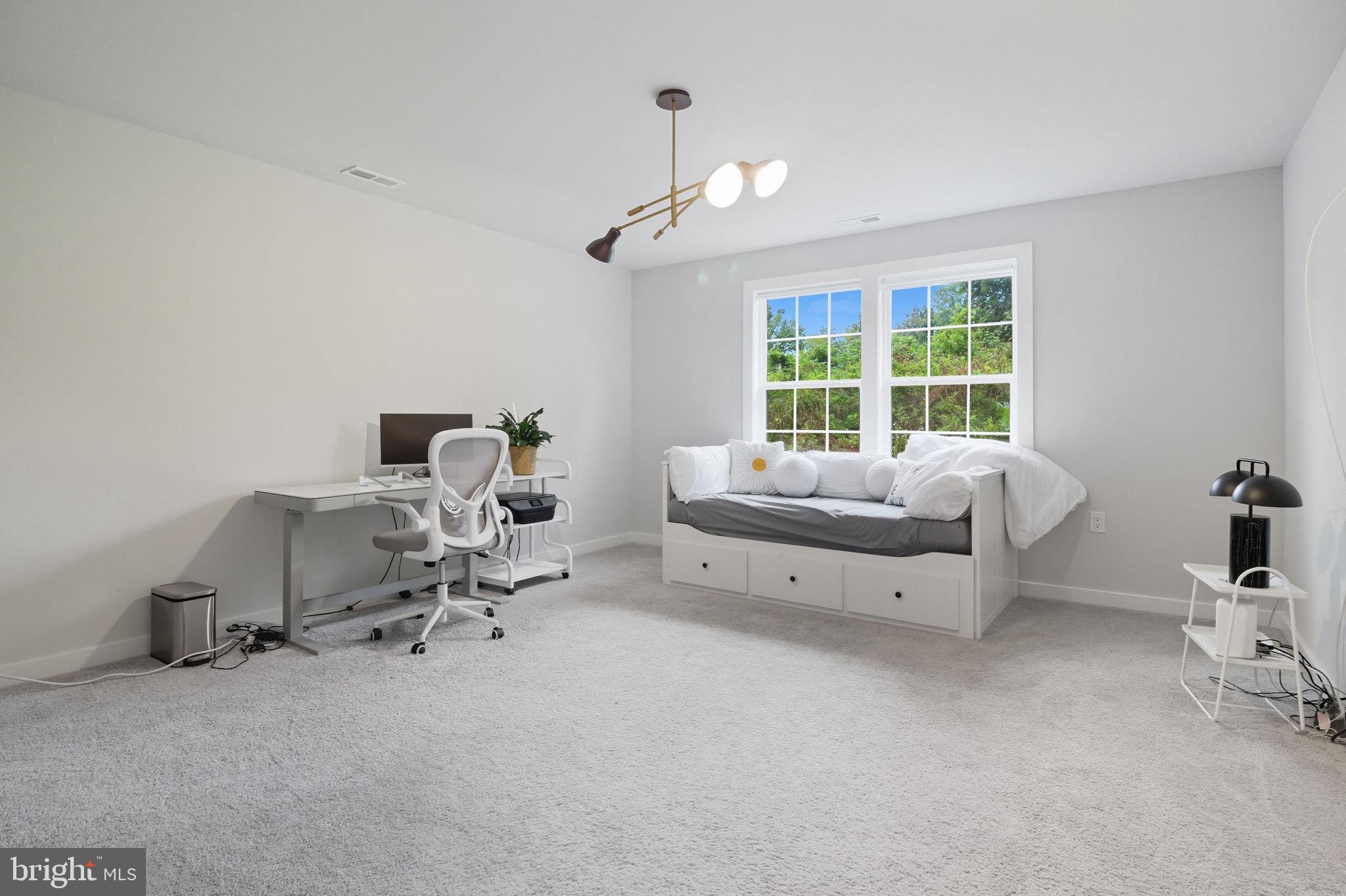 18518 Old Triangle Road Triangle, VA 22172 - Photo 25 of 39 a living room with furniture and a window