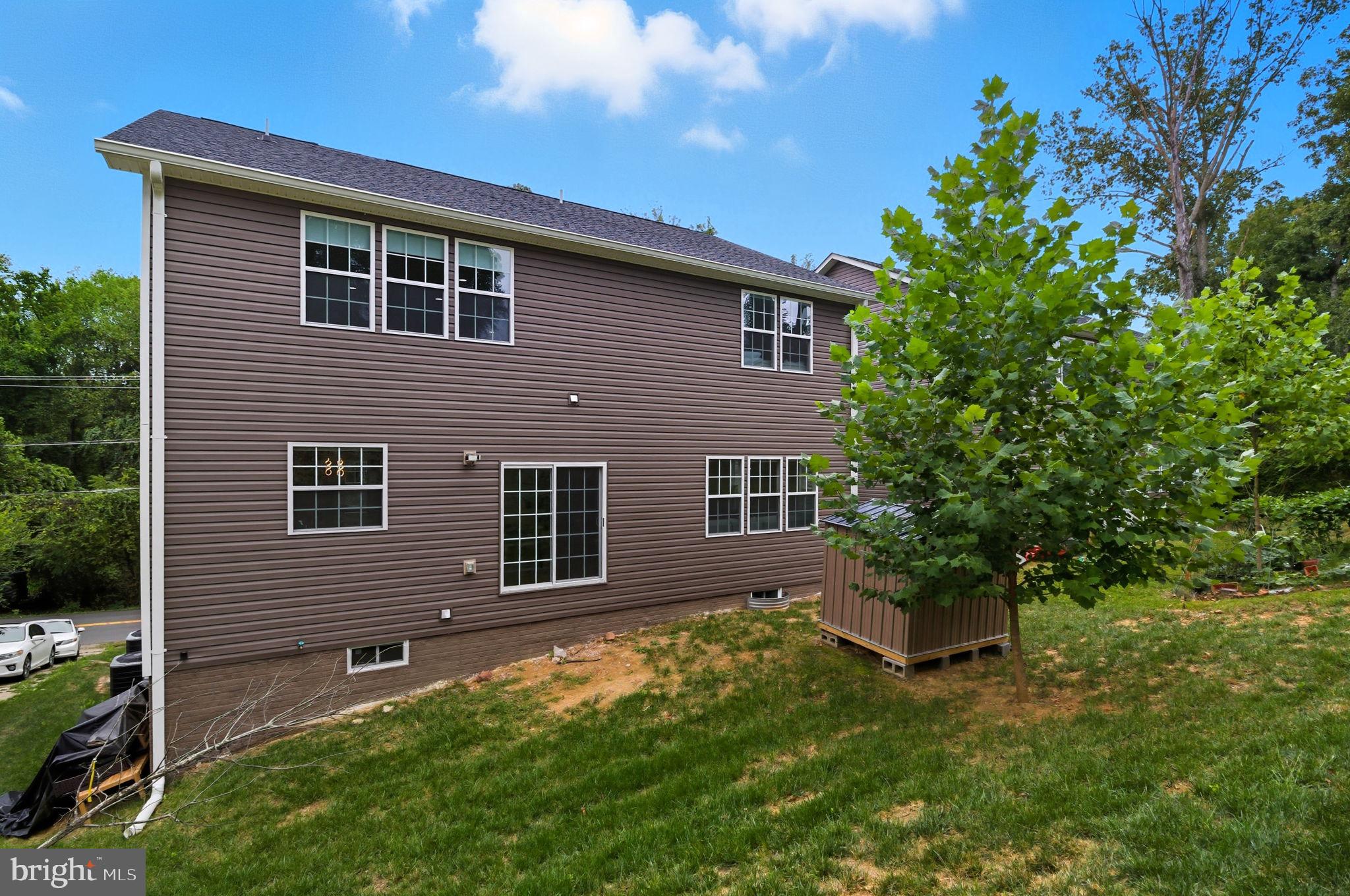 18518 Old Triangle Road Triangle, VA 22172 - Photo 35 of 39 a view of house with backyard