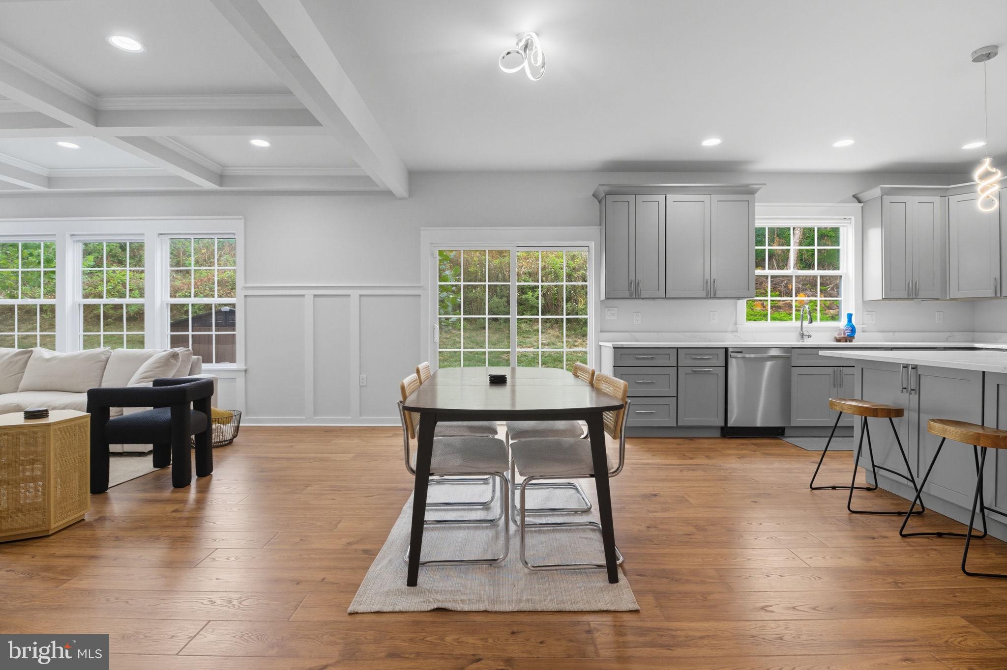 18518 Old Triangle Road Triangle, VA 22172 - Photo 10 of 39 an open kitchen with dining table and chairs