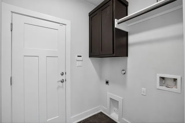 a view of hallway with wooden floor
