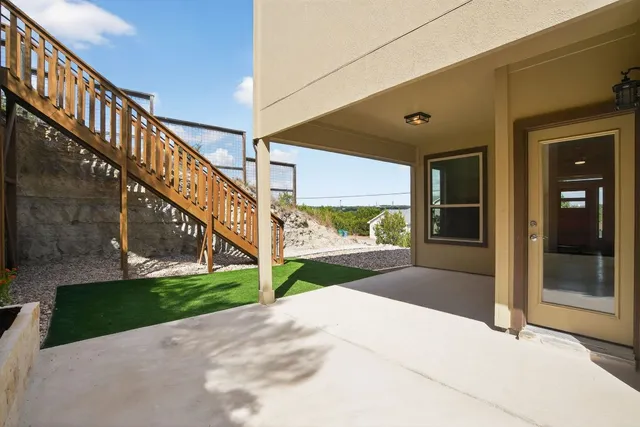 a view of a porch with seating space