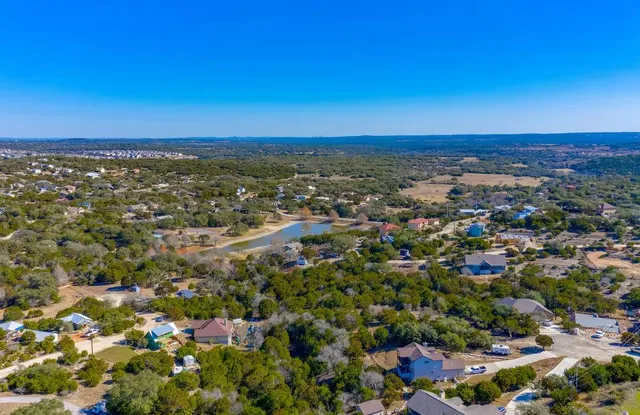 a view of a lake with a city