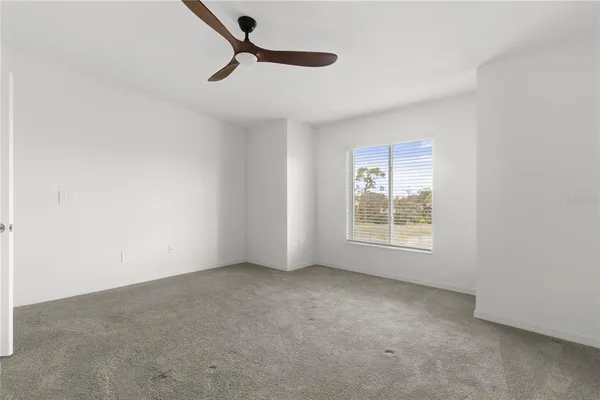 a bathroom with double sink and a mirror