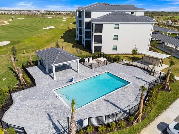 aerial view of a house with swimming pool