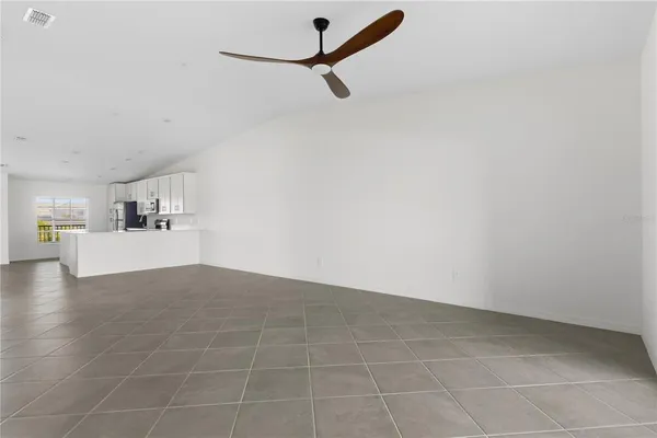 a view of a livingroom with a ceiling fan
