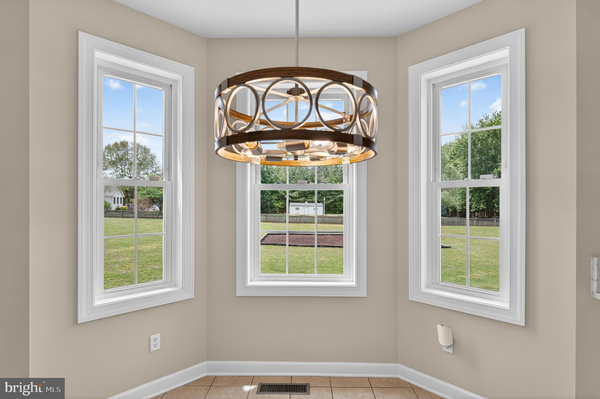337 Roe Ingleside Road Centreville, MD 21617 - Photo 27 of 56 a view of a room that has a window and a chandelier