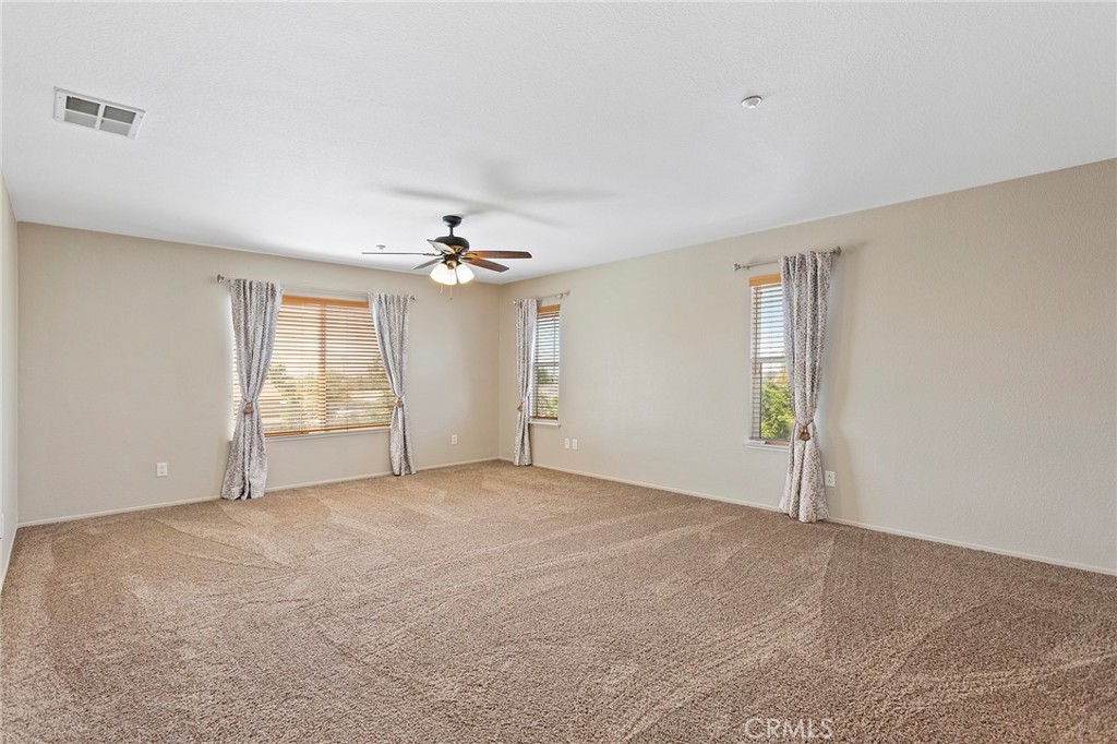 8061 Palm View Lane Riverside, CA 92508 - Photo 16 of 23 a view of an empty room with a window