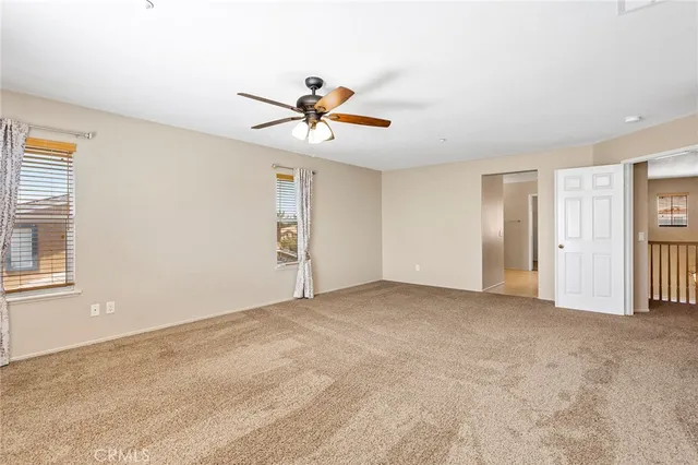 a bathroom with a double vanity sink a mirror and a