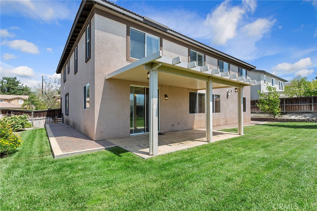 8061 Palm View Lane Riverside, CA 92508 - Photo 22 of 23 a front view of house with yard