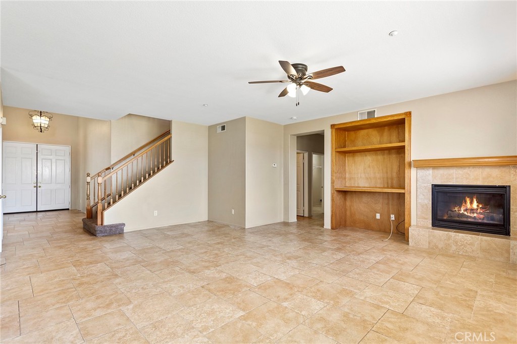 8061 Palm View Lane Riverside, CA 92508 - Photo 7 of 23 a view of an empty room with a fireplace