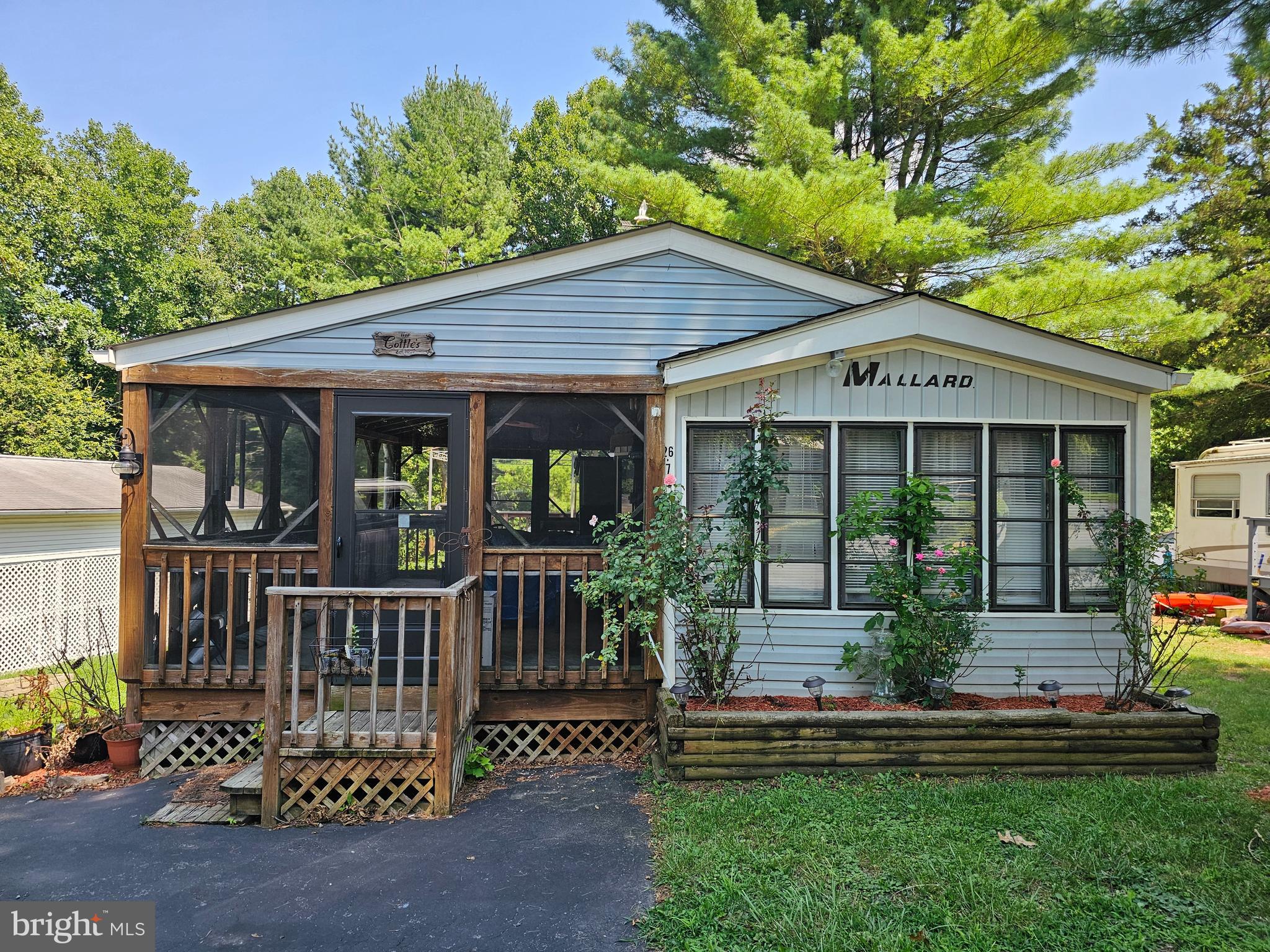 7 Ranger Falling Waters, WV 25419 - Photo 1 of 35 a front view of a house with garden