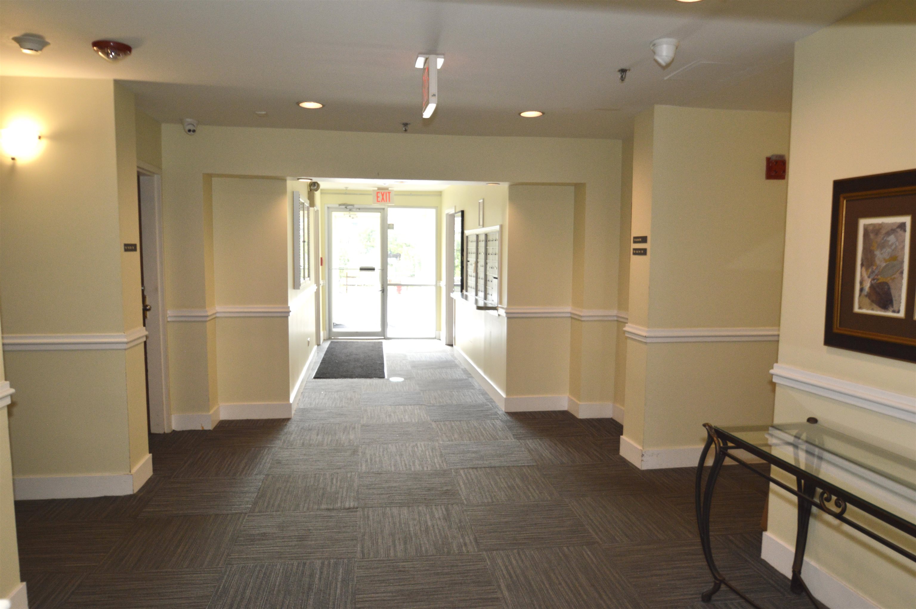 3265 Kirchoff Road Rolling Meadows, IL 60008 - Photo 2 of 14 a view of entryway with a window and wooden floor