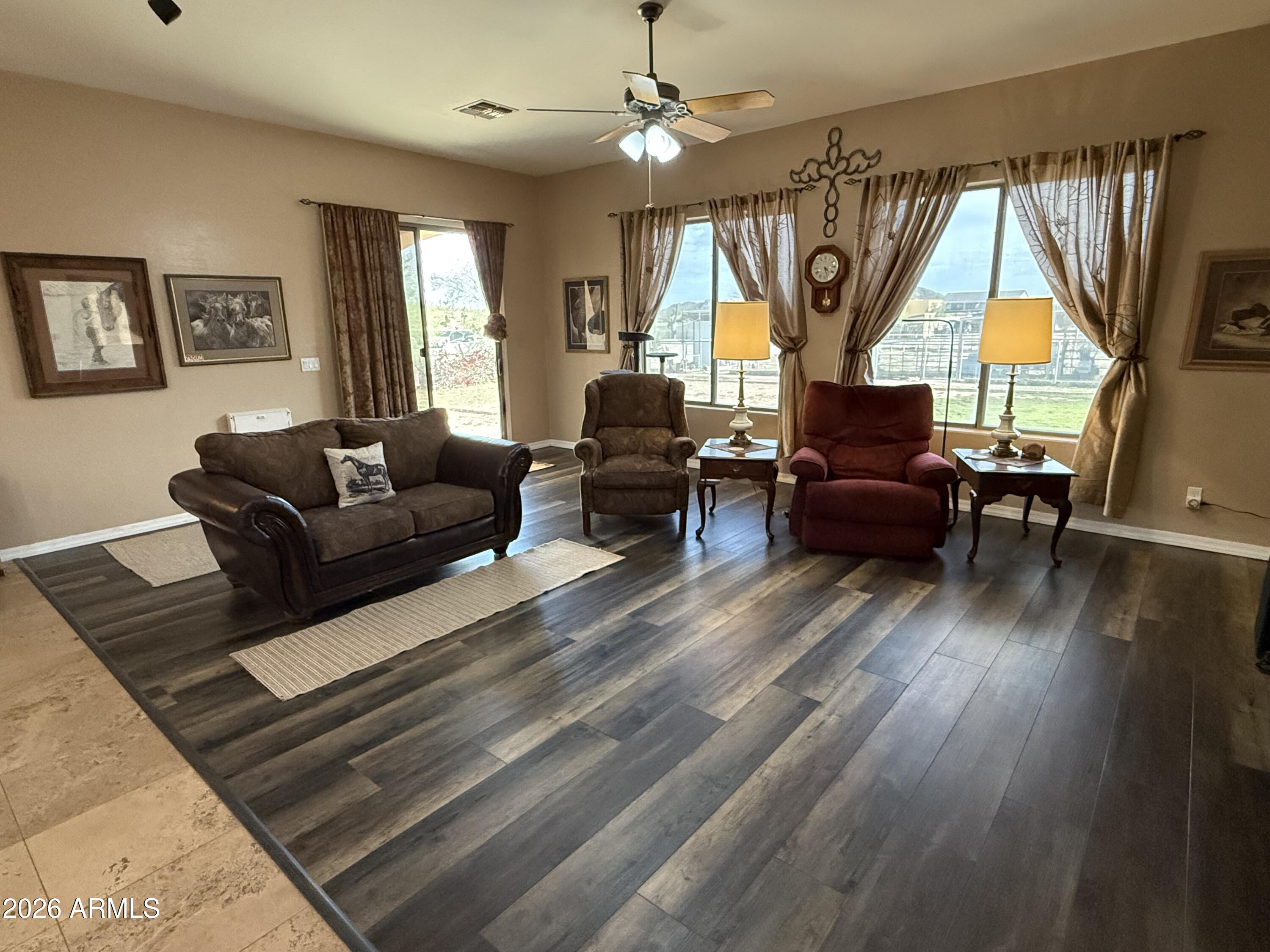 2569 West Silverdale Road San Tan Valley, AZ 85144 - Photo 37 of 61 a living room with furniture and a large window