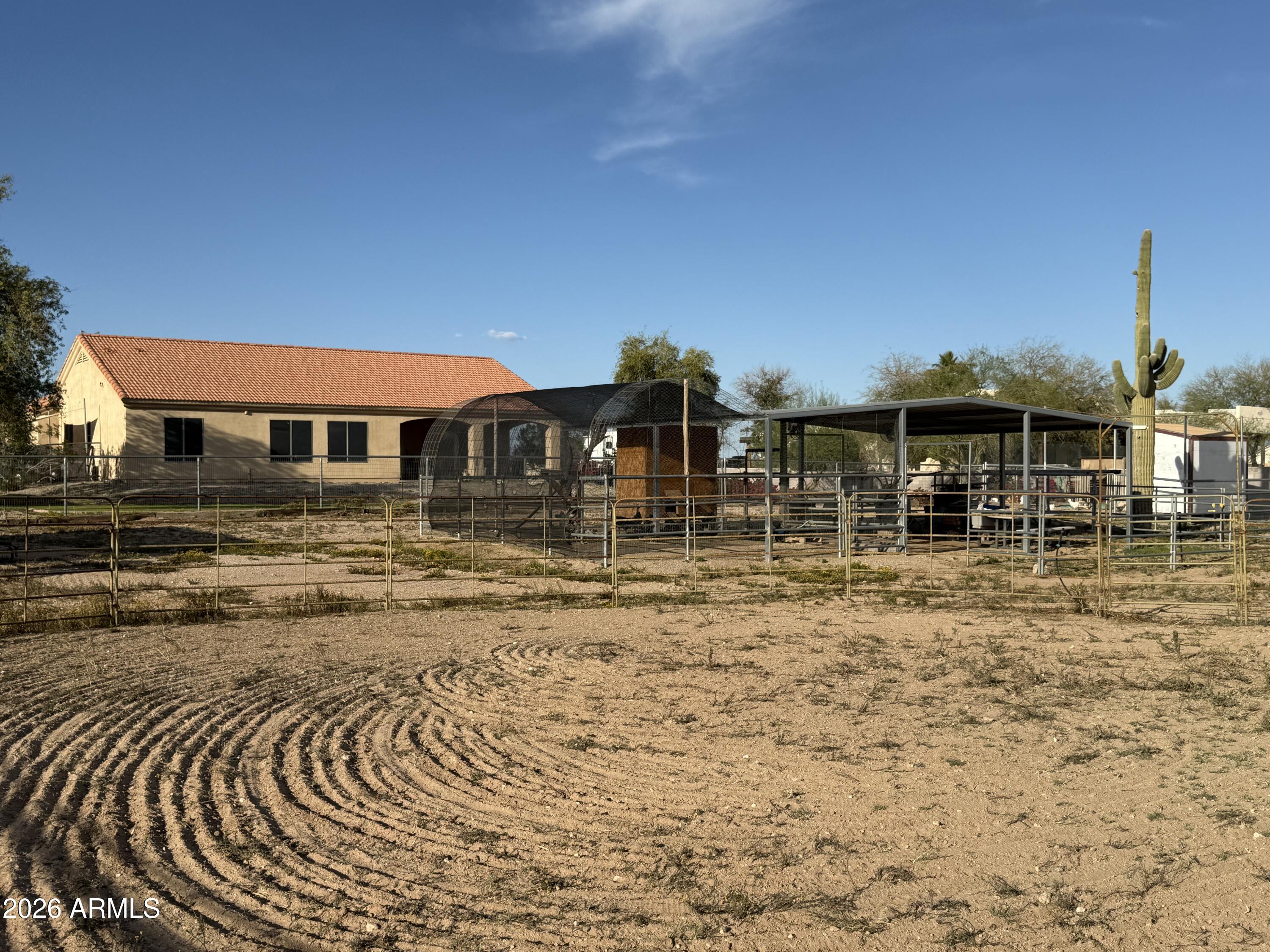 2569 West Silverdale Road San Tan Valley, AZ 85144 - Photo 51 of 61 a view of a house with swimming pool